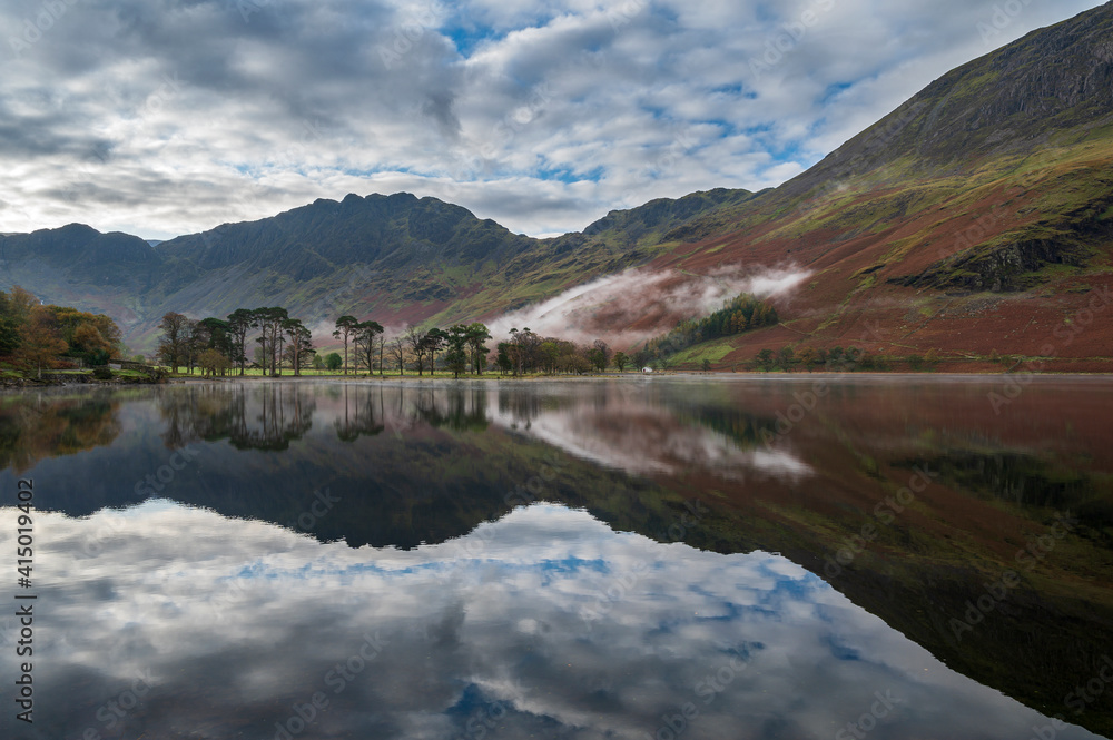 Buttermere reflections in the lake, Lake District National Park, Cumbria Buttermere reflections in the lake, Lake District National Park, Cumbria