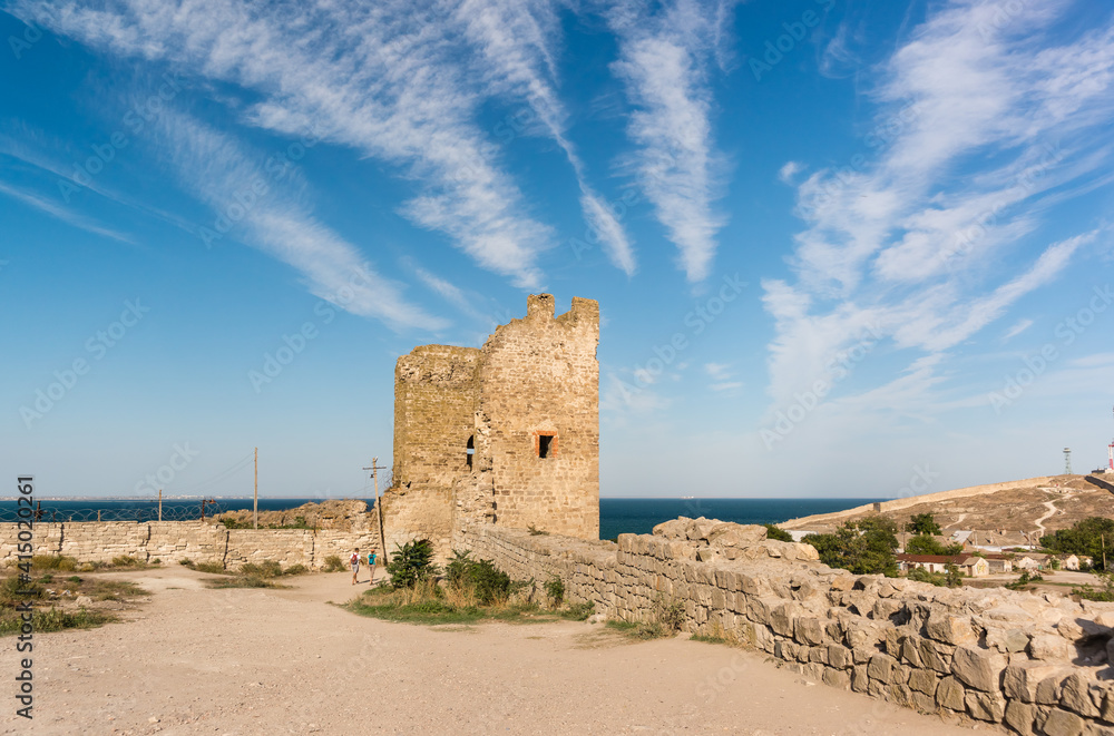 The ancient Genoese fortress of Kafa in Feodosia on the Black Sea coast. The Crisco Tower the southern bastion. Popular tourist attraction of the city The ancient Genoese fortress of Kafa in Feodosia on the Black Sea coast. The Crisco Tower the southern bastion. Popular tourist attraction of the city
