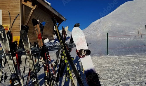 Ski Rack Near the Top of the Alps, Filled with Snow Skiing and Snow Boarding Equipment; Travel Destinations, Sports Adventures