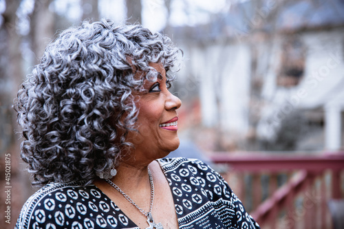 Portrait of senior citizen woman with grey hair photo