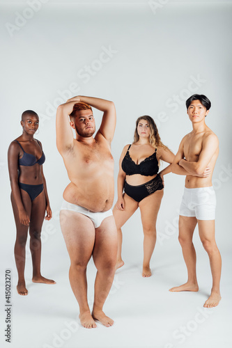 Four young men and women wearing underwear photo