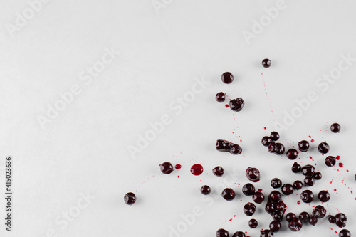 Blackcurrant confiture and syrup isolated on white background