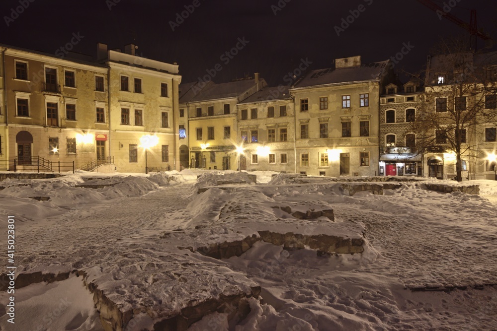 Townhouses of the old town in Lublin covered with white snow