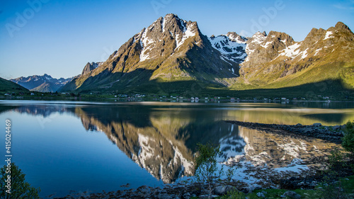 Beautiful Nature Norway natural landscape with mountain reflection on a lake.