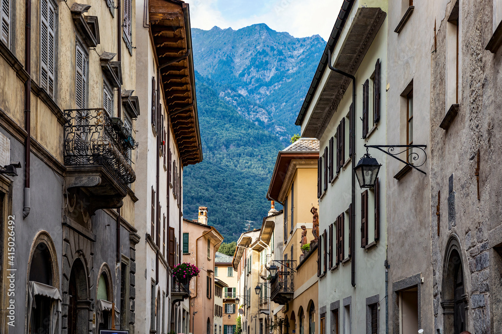 Buildings in old town against mountain, Valchiavenna, Chiavenna, Province of Sondrio, Lombardy, Italy Buildings in old town against mountain, Valchiavenna, Chiavenna, Province of Sondrio, Lombardy, Italy