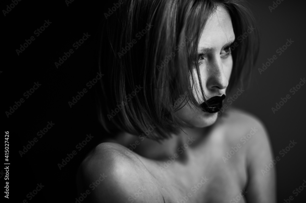 Beautiful fashion woman. Close emotional portrait of a redhead. Selective focus Beautiful fashion woman. Close emotional portrait of a redhead. Selective focus