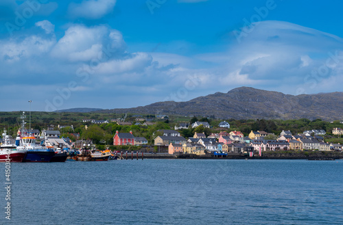 View of harbour and otwn of Castletown Bere in the south of Ireland and the mountains at the background.