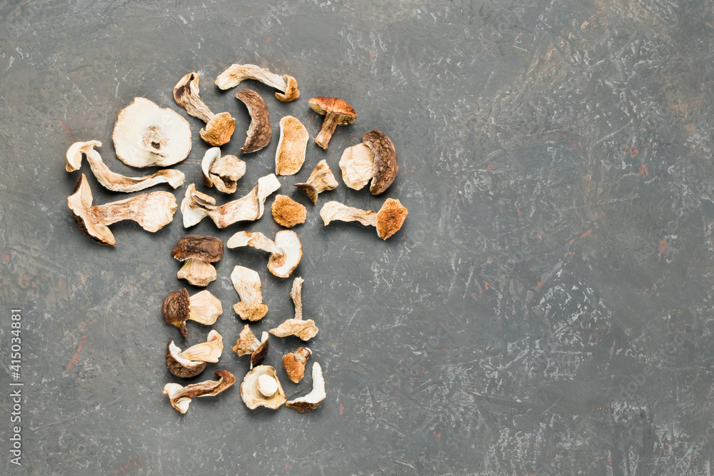 Dried porcini mushrooms on a decorative background Dried porcini mushrooms on a decorative background