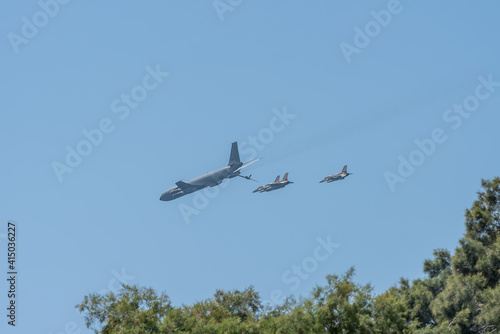 Military airplanes. Independence Day in Israel, a national holiday. Israel Air Force parade in the blue sky