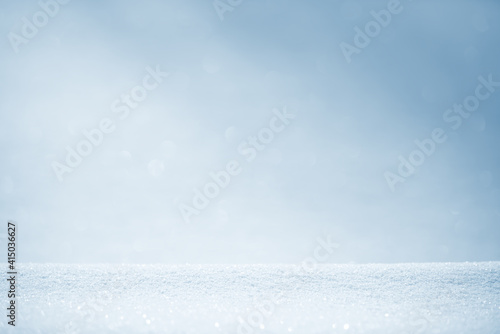 Fresh clean white snow background texture. Winter background with snowflakes and snow mounds. Snow lumps. Seasonal landscape details. Soft beautiful bokeh. © Сyrustr