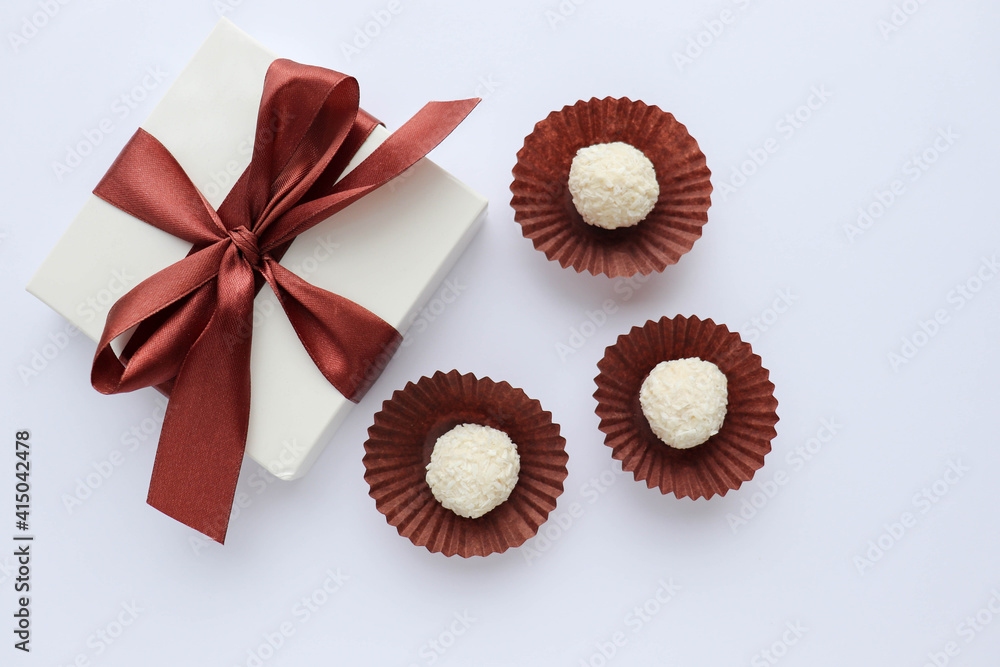 candy and sweets. beautiful gift boxes and chocolates isolated on a white background. candy and sweets. beautiful gift boxes and chocolates isolated on a white background.