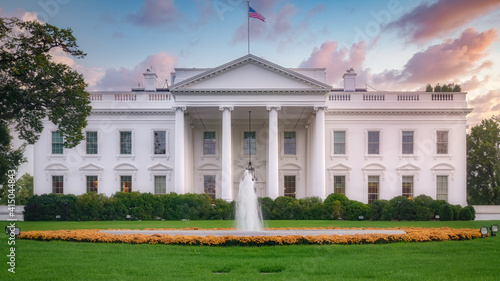 The white house in Washington DC in the USA surrounded by green garden photo