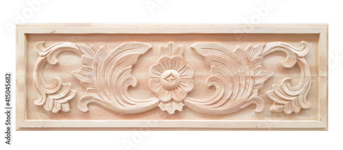 Pattern of flower carved on wood background