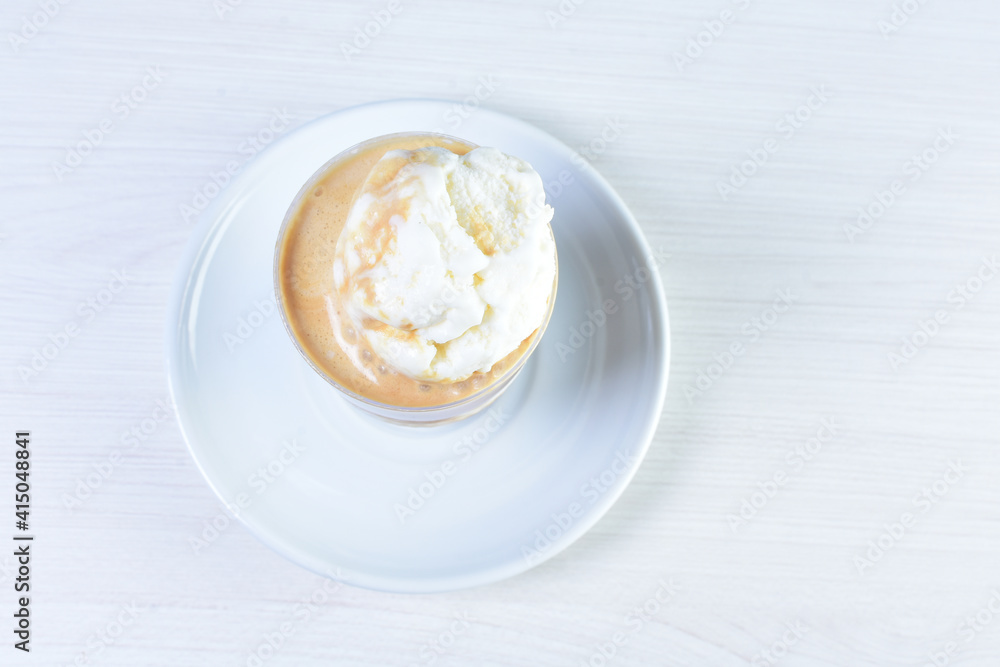 Coffee and chocolate milkshakes, with chantilly cream on white wooden background
Coffee and chocolate milkshakes, with chantilly cream on white wooden background