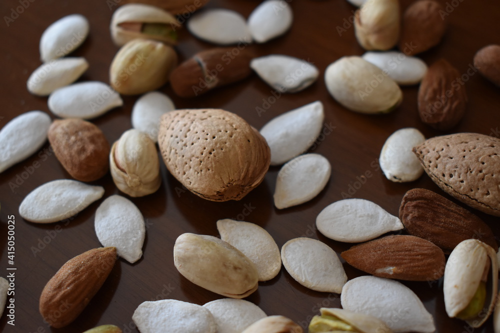 DRY FRUITS ON BROWN BACKGROUND
DRY FRUITS ON BROWN BACKGROUND