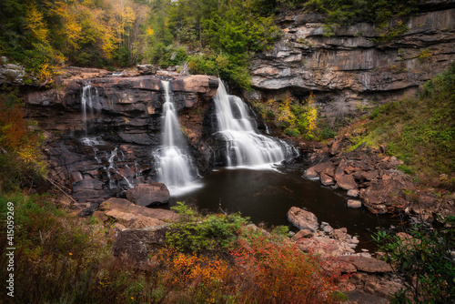 Blackwater Falls in surrounded by Autumn colors within Blackwater Falls State Park  West Virginia.