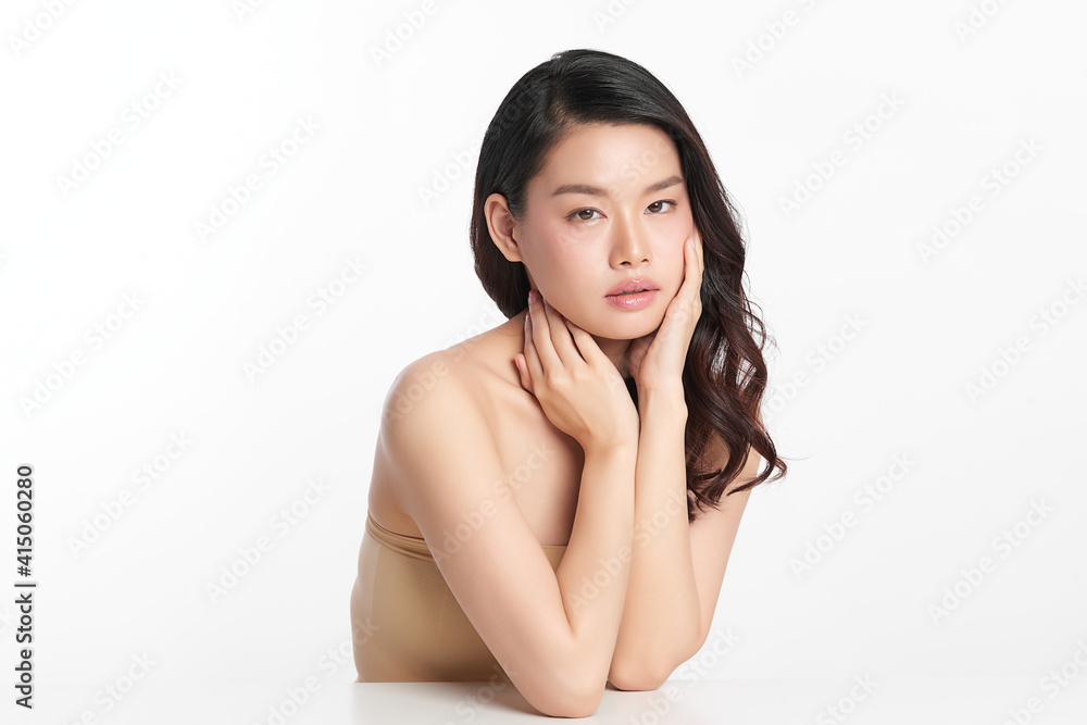 Beautiful young asian woman with clean fresh skin on white background, Face care, Facial treatment, Cosmetology, beauty and spa, Asian women portrait Beautiful young asian woman with clean fresh skin on white background, Face care, Facial treatment, Cosmetology, beauty and spa, Asian women portrait