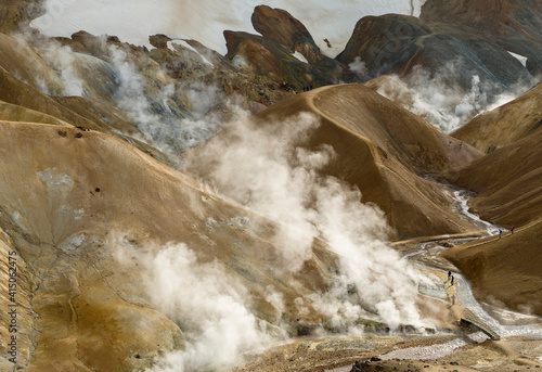 Hikers in the geothermal area of Hveradalir in the mountains of Kerlingarfjoll in the highlands of Iceland. © Danita Delimont