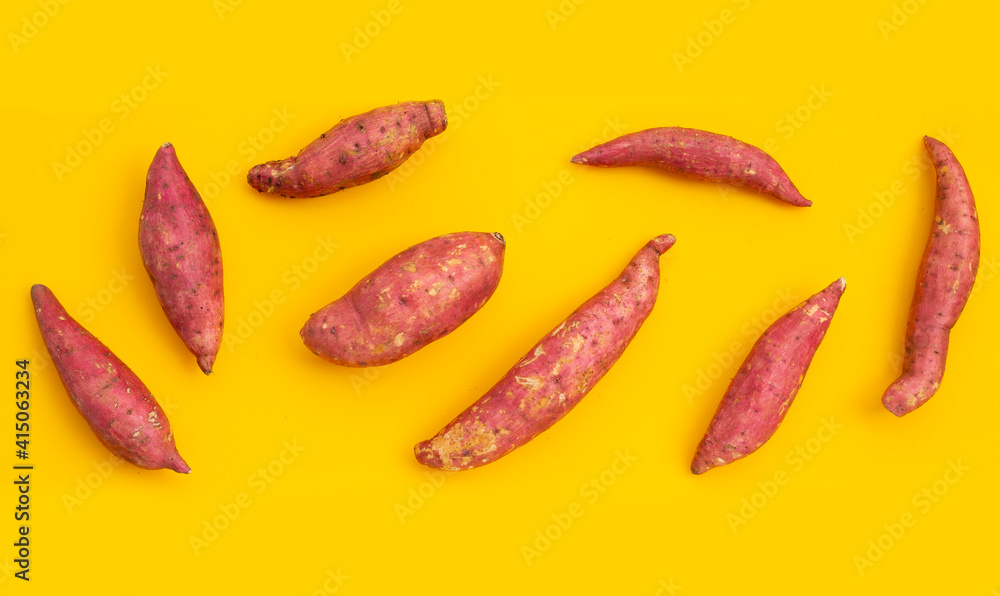 Sweet potato on yellow background. Sweet potato on yellow background.