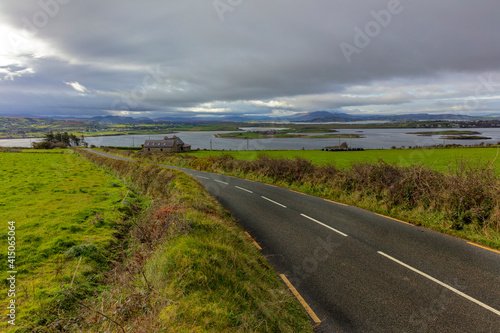 Small road over Drongawn Lough on the Fanad Peninsula, Ireland