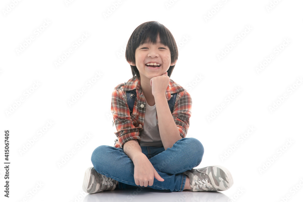 Happy asian student sitting on white background isolated.. Happy asian student sitting on white background isolated..