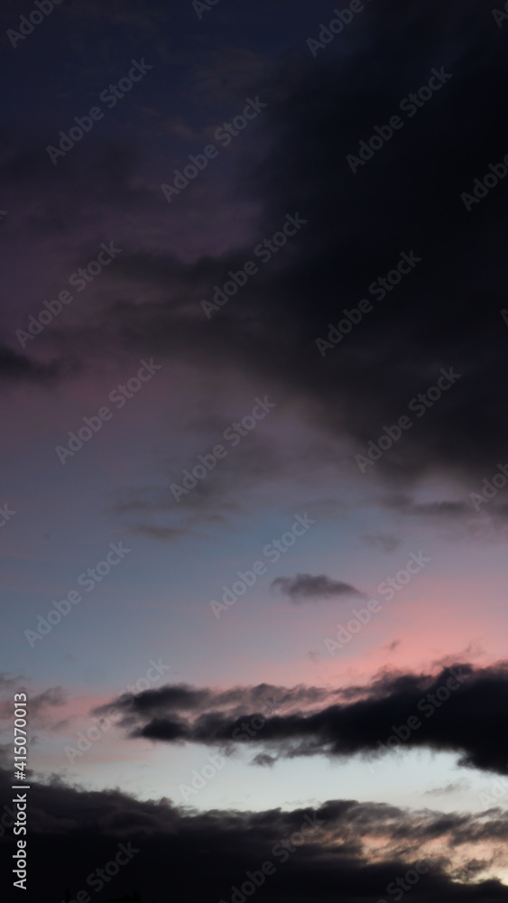 Portrait Shot of Pastel Sky Gradient Clouds during Dawn Phone Wallpaper