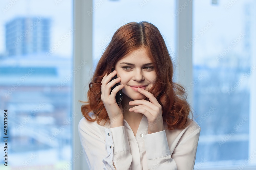 woman manager in office talking on the phone technology woman manager in office talking on the phone technology