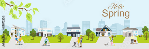 People in the residential area, Springtime townscape - Banner ratio, Included greeting word "Hello Spring"