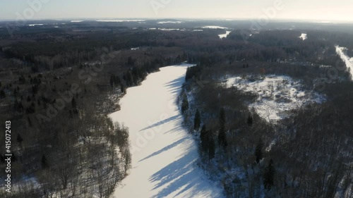 Wallpaper Mural Long Frozen Lake Between Dense Forest On A Sunny Day At Wintertime. - aerial Torontodigital.ca
