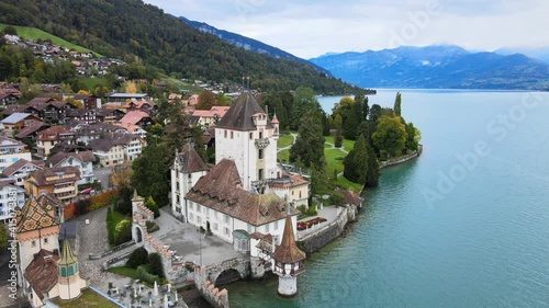 Wallpaper Mural Famous Castle Oberhofen at Lake Thun in Switzerland - drone footage Torontodigital.ca