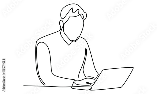 Continue line of man at his desk is working on the laptop computer