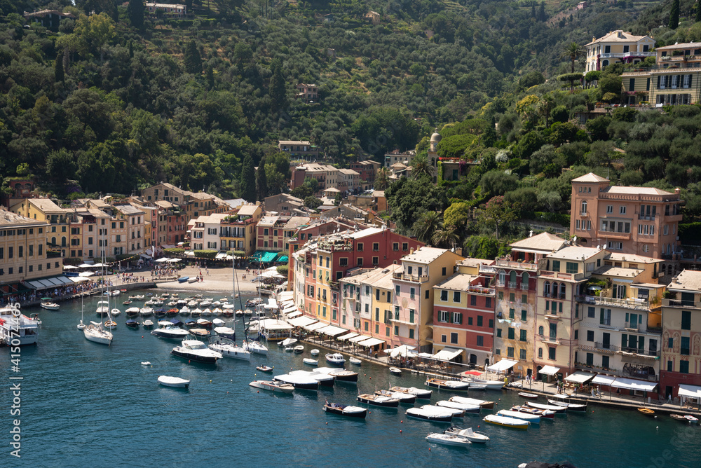 Italy, Genoa province, Portofino. Upscale fishing village on the Ligurian Sea, pastel buildings overlooking harbor