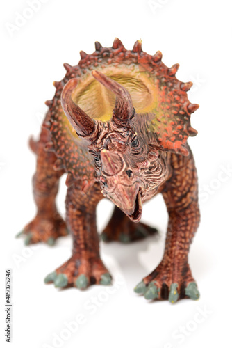 Styracosaurus dinosaur figure toy on white background © zcy