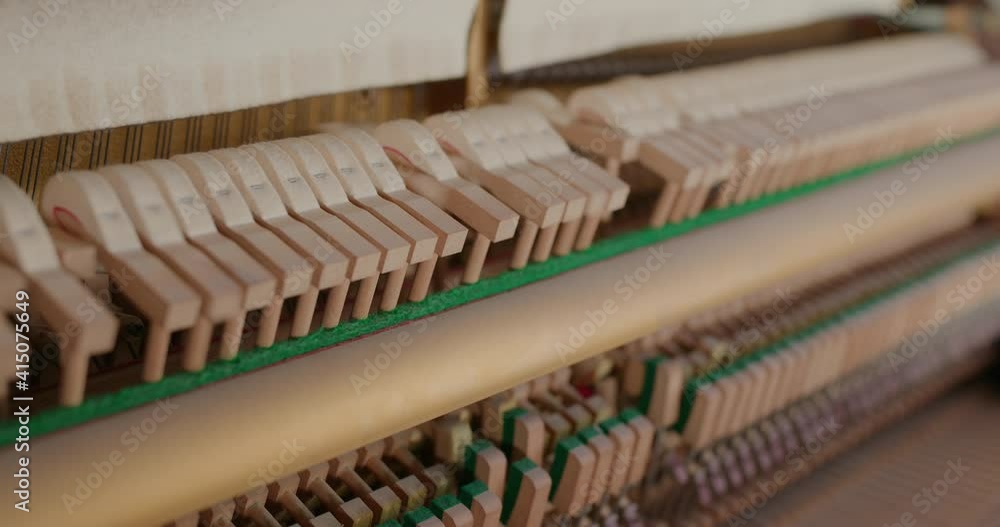 Piano hammers hit the strings Piano hammers hit the strings