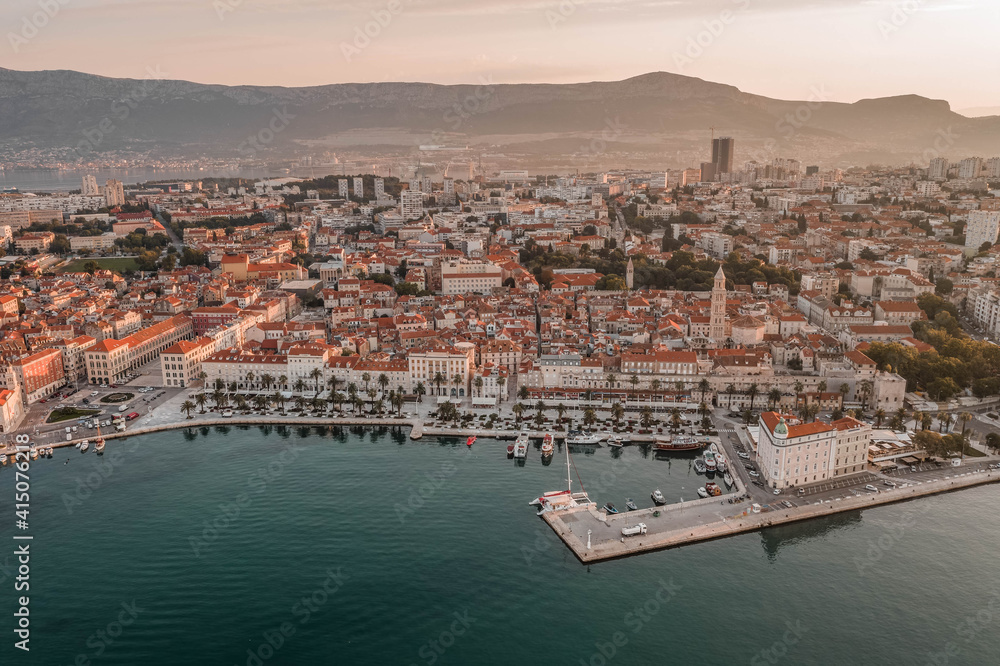 Aeril drone shot of Diocletian Palace in rising sun light morning in Split old town Croatia
