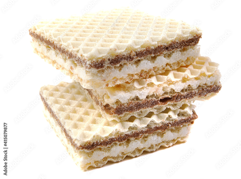 A stack of square waffles is isolated on a white background. A stack of square waffles is isolated on a white background.