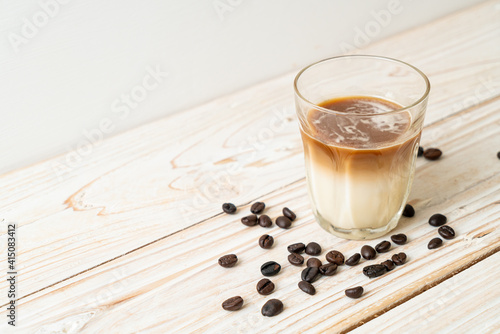 Dirty coffee, cold milk topped with hot espresso coffee shot