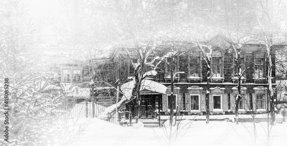 Old wooden houses under the snow. Russia. Siberia. Winter. The city of Tomsk 2021