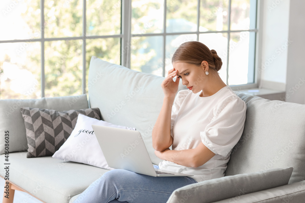 Stressed young woman asking psychologist for advice online at home Stressed young woman asking psychologist for advice online at home