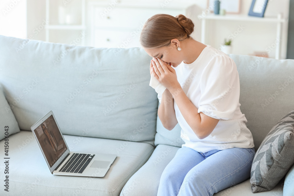 Stressed young woman asking psychologist for advice online at home Stressed young woman asking psychologist for advice online at home