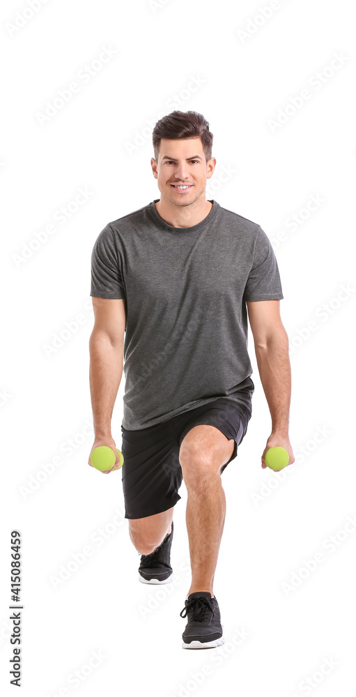 Sporty young man training with dumbbells on white background Sporty young man training with dumbbells on white background