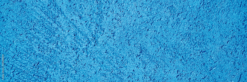 abstract textured tinted classic blue color surface texture rough background, cement concrete floor or wall. color trend 2020 year. banner abstract textured tinted classic blue color surface texture rough background, cement concrete floor or wall. color trend 2020 year. banner