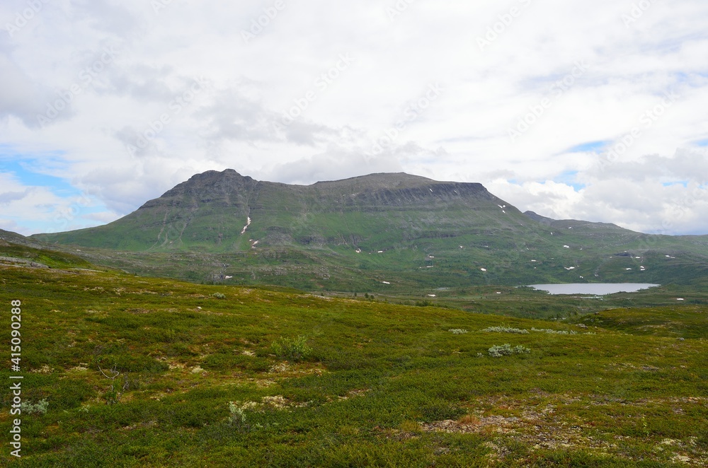 Fototapeta premium majestic mountain landscape with small lakes in maalsev, northern Norway, with the famous mountain Mauken in the background