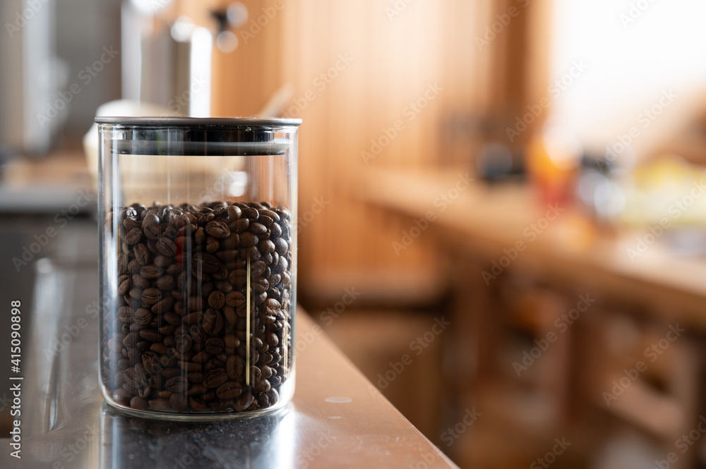 Coffee beans in jars for easy use as banner material for coffee and cafes. Coffee beans in jars for easy use as banner material for coffee and cafes.