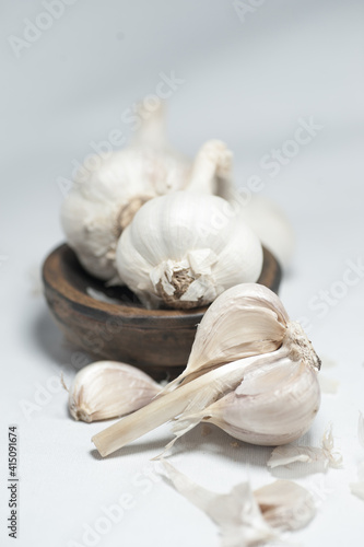 This is Bawang Putih or Garlic or Allium sativum. Commonly used for cooking spices or traditional medicine