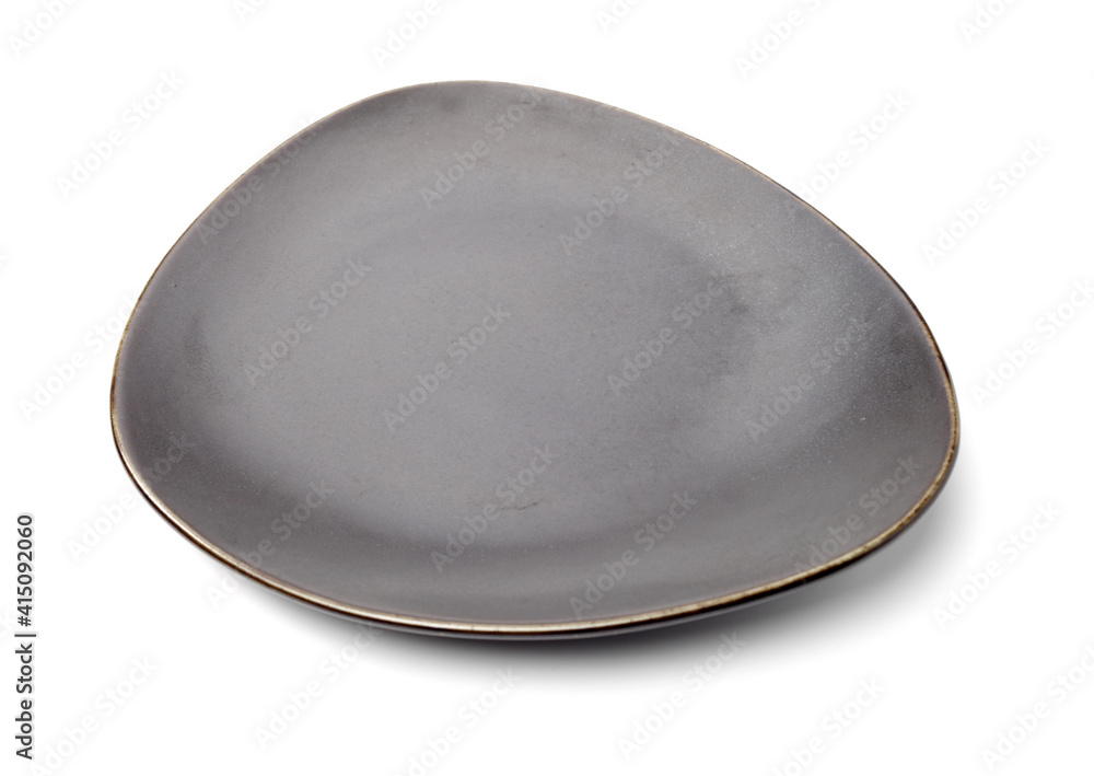 Empty earthenware plate on white background Empty earthenware plate on white background