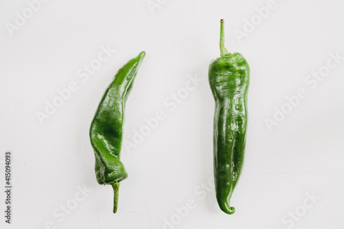geen peppers on white background