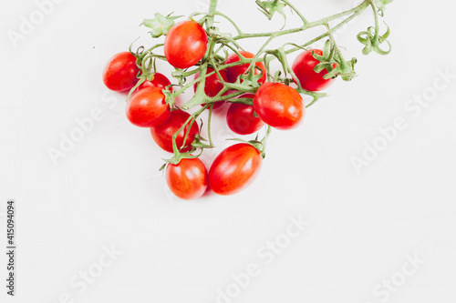 cherry tomatoes on a vine