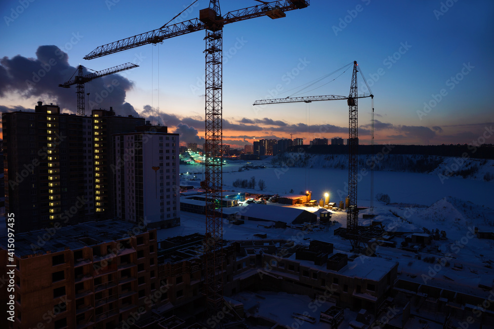 Night view of the construction site of a new house. Moscow region, Dzerzhinsky. January 2021.