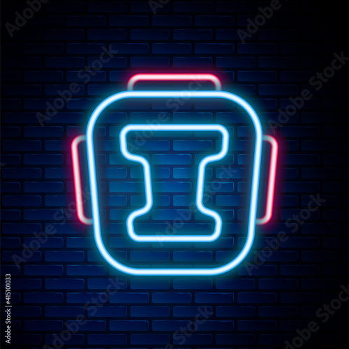 Glowing neon line Boxing helmet icon isolated on brick wall background. Colorful outline concept. Vector.